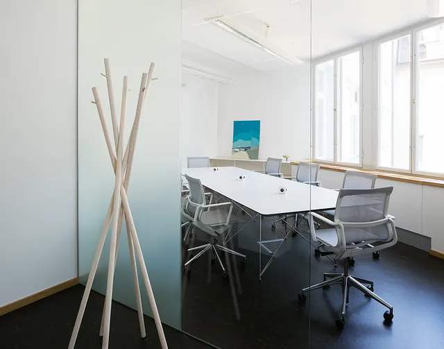 Office workspace with desks and natural light