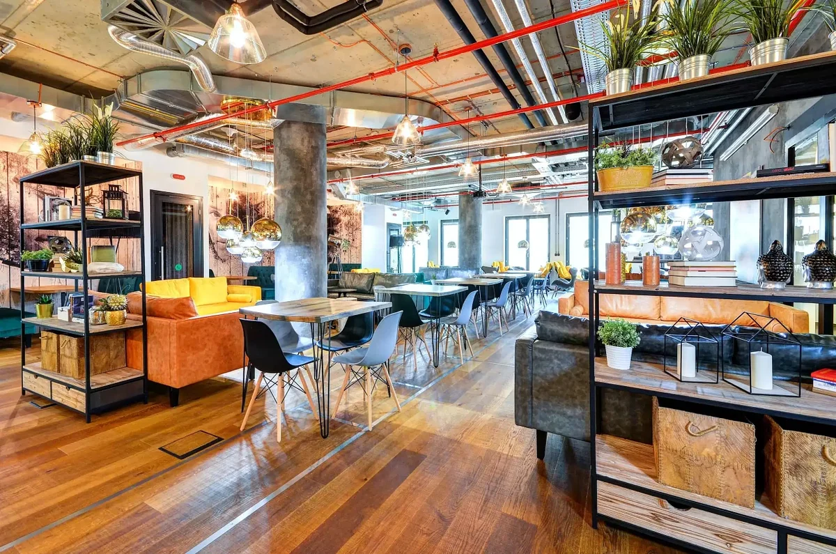 Coworking lounge area with armchairs and modern design